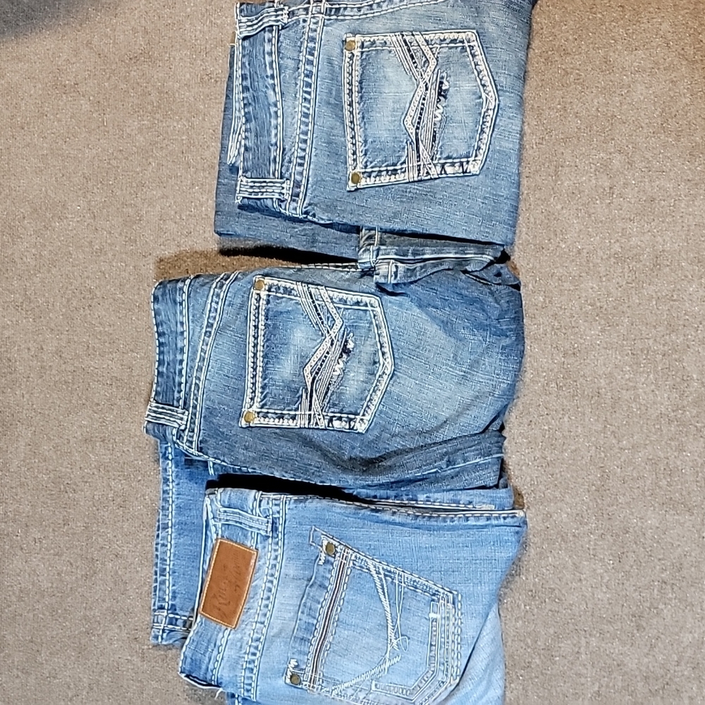 3 pairs of Rock 47 means jeans. 1st pair is a 33x32 and the last 2 are 31x36